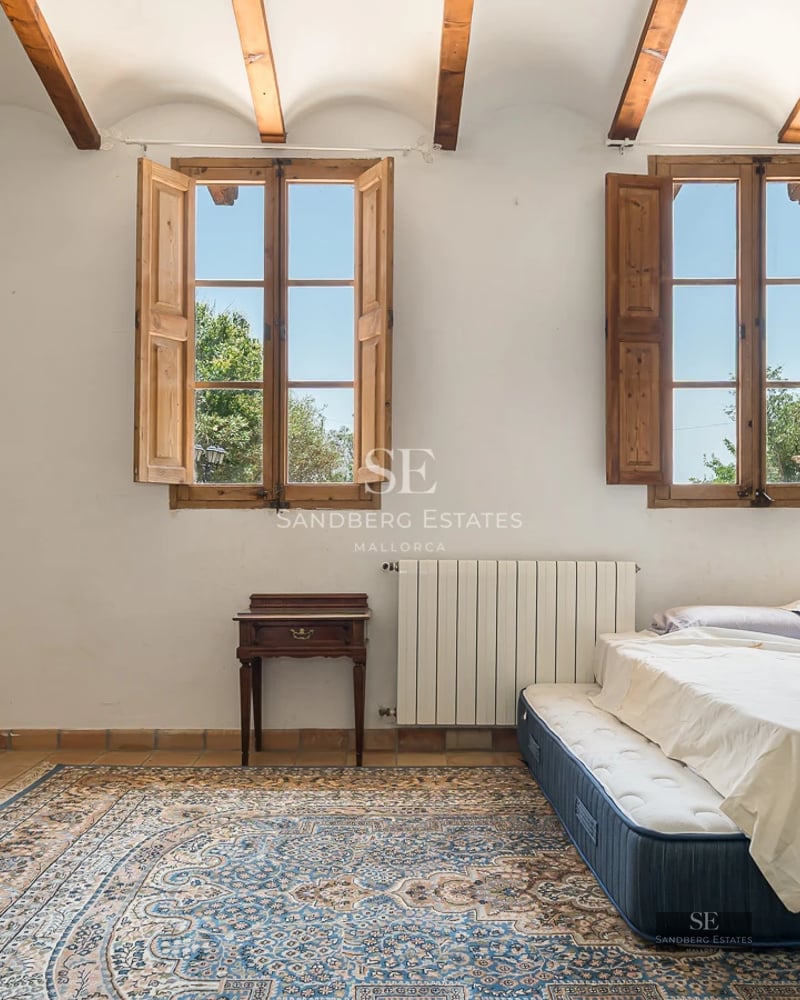 Spacious living room with balcony and views. Modern interior, abundant natural light, and designer furniture. High-quality finishes.