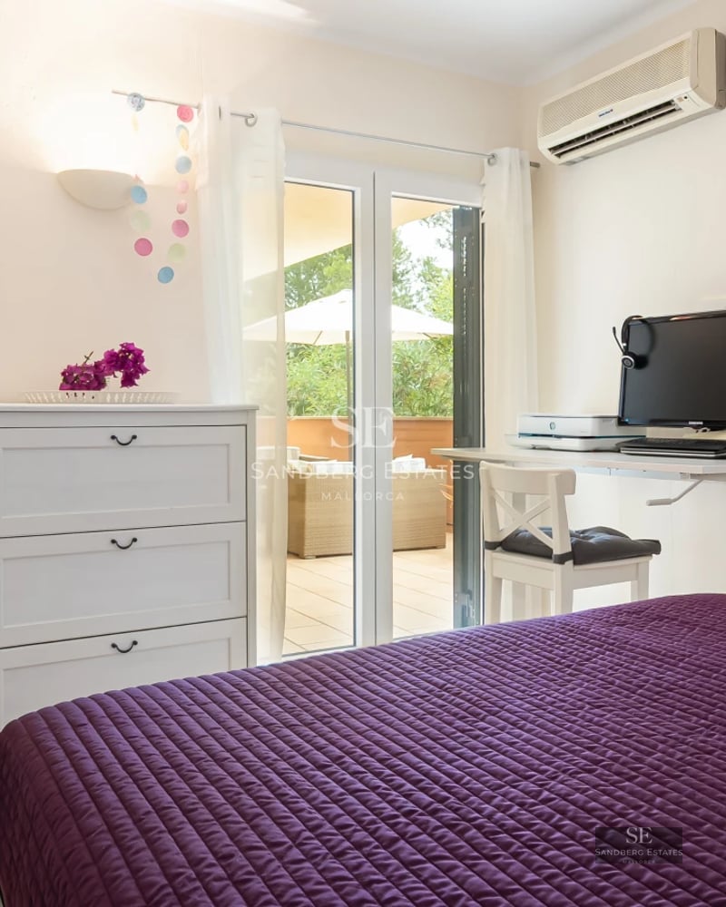 Exterior view of a modern villa with infinity pool, large terraces, minimalist design, and lush greenery. Warm lighting.