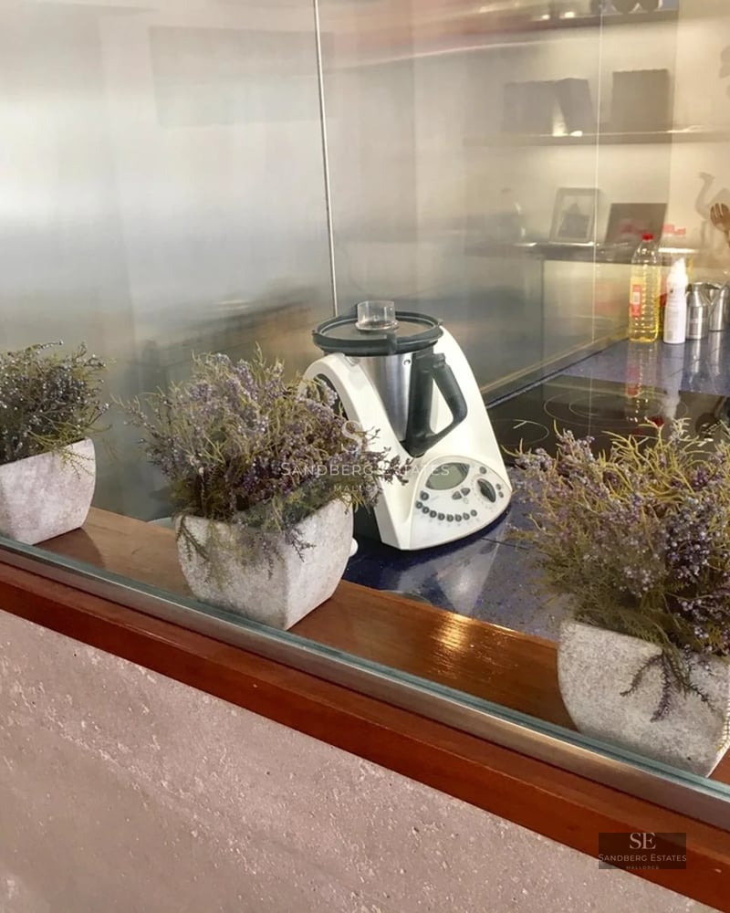 View of a modern villa with reflecting pool. Clean architecture, large windows, and manicured landscaping. Soft lighting and relaxing ambiance.