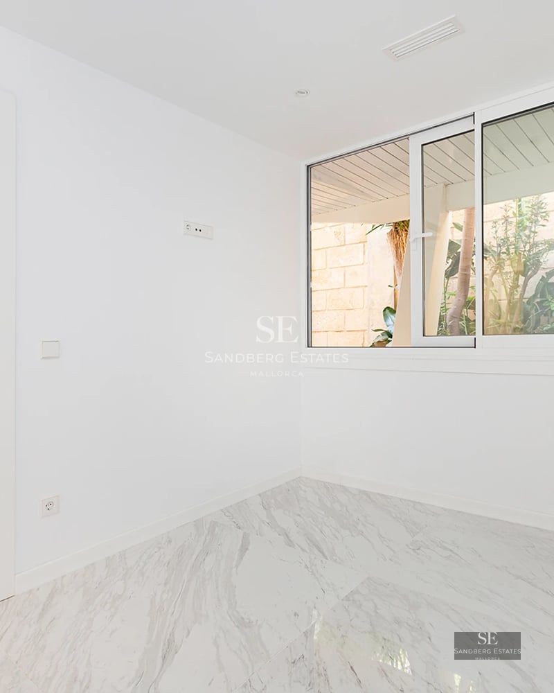 Exterior view of modern villa with pool. Sleek, minimalist architecture, large windows, and manicured landscaping.