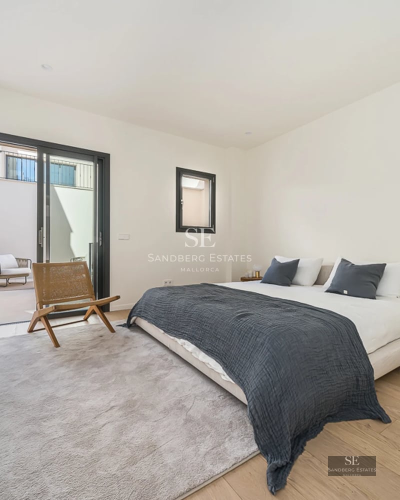 Spacious balcony with glass railing and panoramic sea views. Modern and stylish outdoor furniture. High-quality finishes throughout.