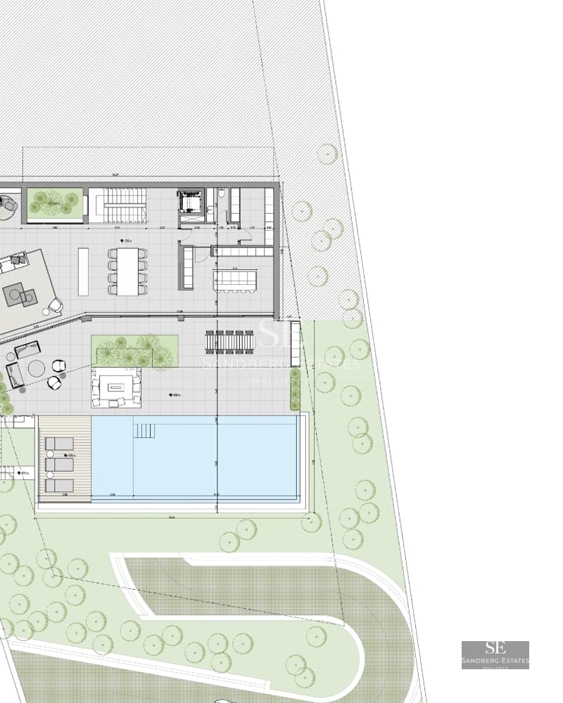 View of infinity pool surrounded by lush greenery. Modern architecture with large glass windows and landscape design.