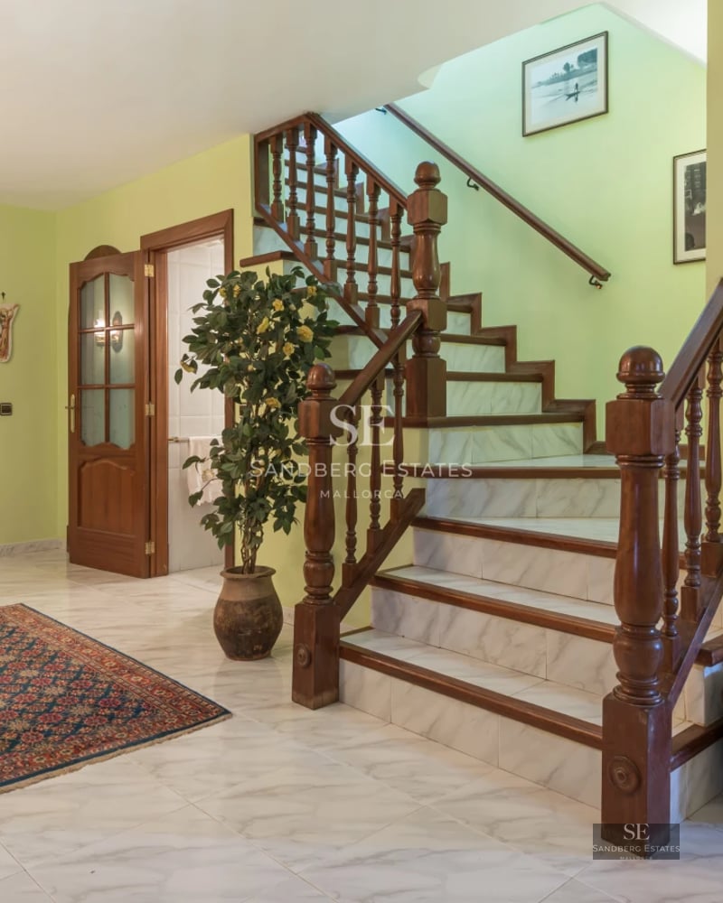 Spacious terrace with pool, sun loungers, and panoramic views. Modern design with elegant furniture. Natural lighting.