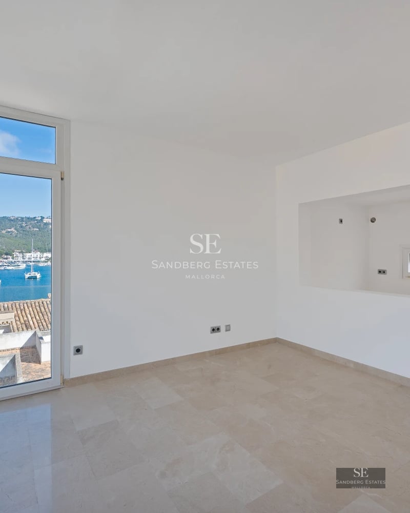 View of a luxurious villa with pool and lush garden. Modern architecture with large windows and elegant design.