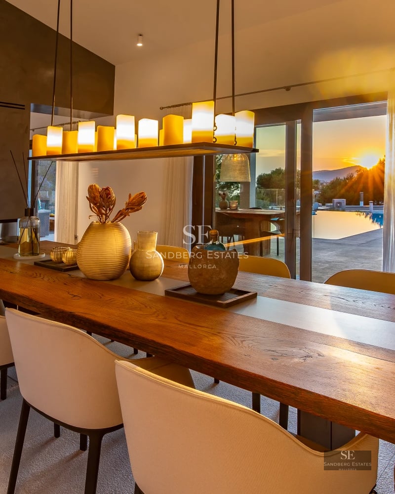 Spacious terrace with infinity pool, panoramic views, sun loungers, and modern design. Ideal for relaxation and enjoying the outdoors.