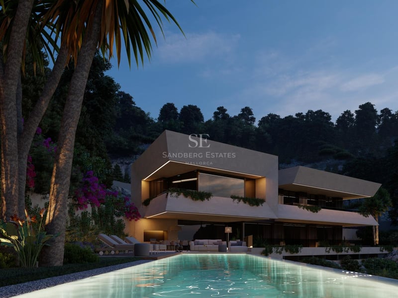 Modern two-story villa with cantilevered balconies overlooking an illuminated pool and tropical greenery at twilight.