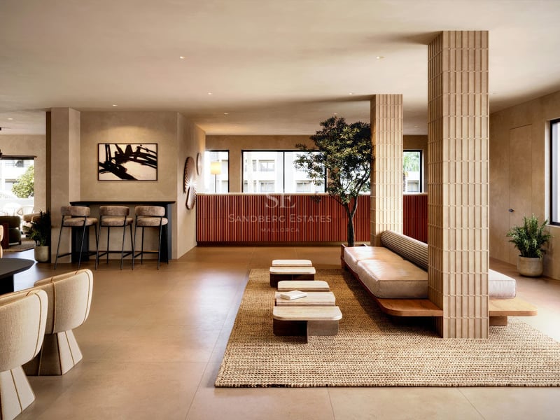 Hall de luxe moderne avec colonnes cannelées, mobilier minimaliste et palette de couleurs neutres.