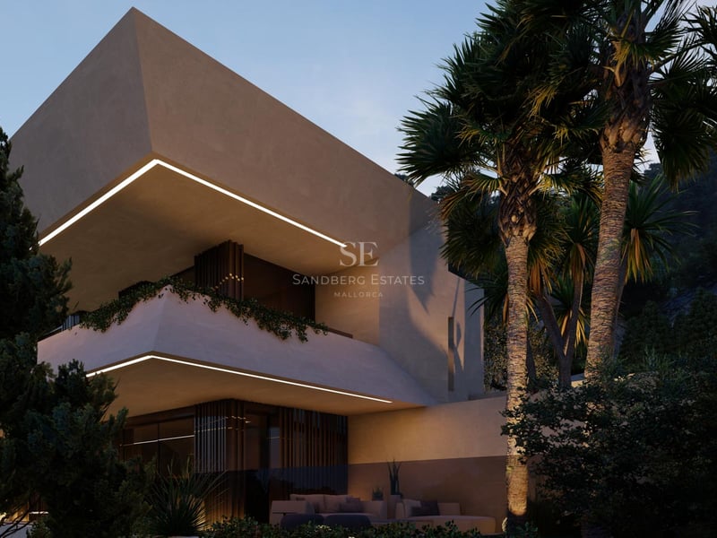 Dusk shot of a multi-level contemporary villa with geometric concrete balconies and integrated warm LED lighting.