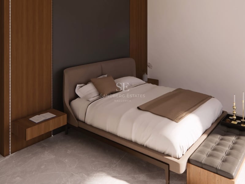 Chambre moderne avec lit rembourré, sol en marbre et boiseries en chêne avec éclairage intégré.