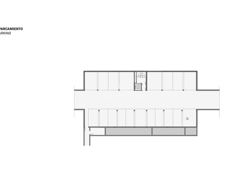 Plan architectural 2D d'un parking souterrain montrant les emplacements, l'ascenseur et une place handicapé.