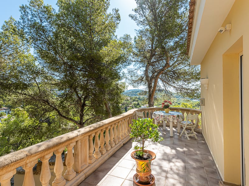 Expansive terrace featuring an infinity pool, panoramic views, stylish outdoor furniture, and minimalist design. Natural lighting and high-end materials.