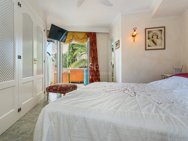 Exterior view of a modern villa with a pool, spacious garden, and panoramic sea views. Minimalist architecture, luxurious finishes.