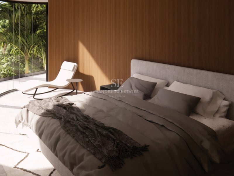 Chambre moderne avec boiseries en chêne, lit en lin gris et baie vitrée ouvrant sur une terrasse ensoleillée.