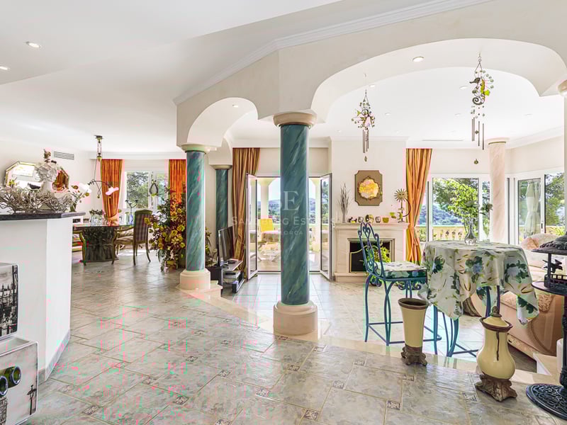 Spacious terrace with infinity pool, sun loungers, and panoramic views. Modern design featuring ambient lighting and high-quality materials.