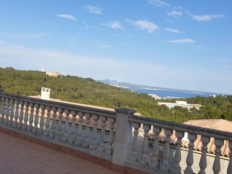 Exterior view of a modern villa with infinity pool, lush garden, and minimalist architecture. Warm lighting and elegant design.