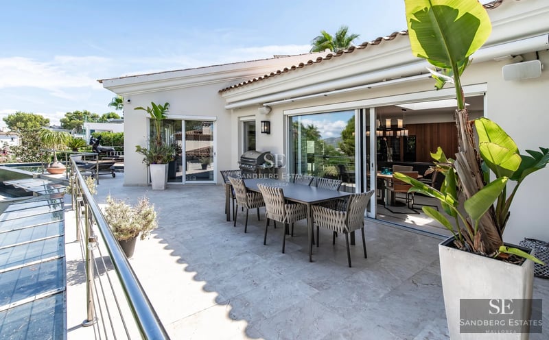 Expansive terrace with pool and sea views. Modern architecture with sleek finishes and designer outdoor furniture.