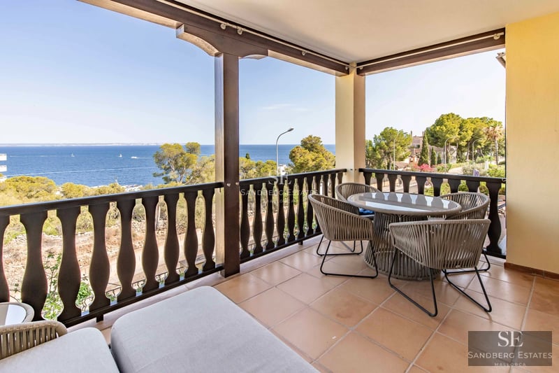 Modern apartment with balcony and sea view. Minimalist design, elegant furniture and abundant natural light.