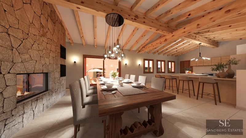 Spacious dining room featuring a massive wooden table, large stone fireplace, and exposed timber ceiling beams.