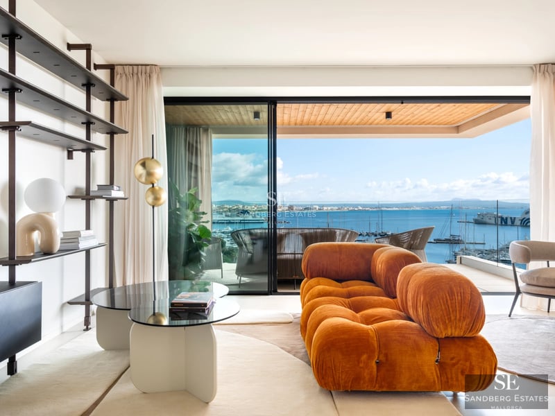 Exterior view of a modern villa with pool, large windows, and lush landscaping. Minimalist architecture with luxury touches.