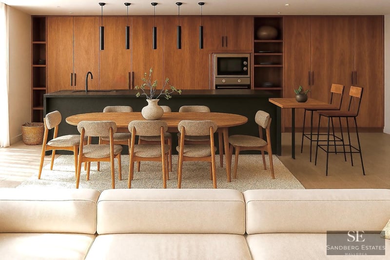 Modern kitchen featuring wood cabinetry, a black island, and an oval dining table with six chairs on a light rug.