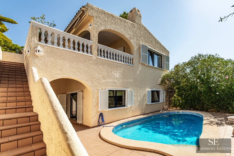 Exterior view of a luxury home featuring a pool, large garden, and modern architecture. Soft lighting, neutral color palette.