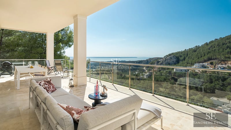 Modern exterior with pool, garden and large windows illuminating the interior. Minimalist design with clean lines.