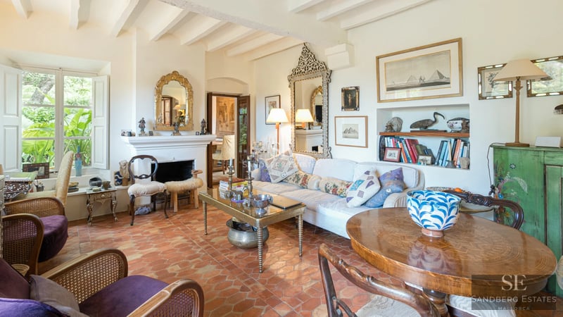 Panoramic view of a modern villa with infinity pool. Stone details, large windows, and minimalist design.
