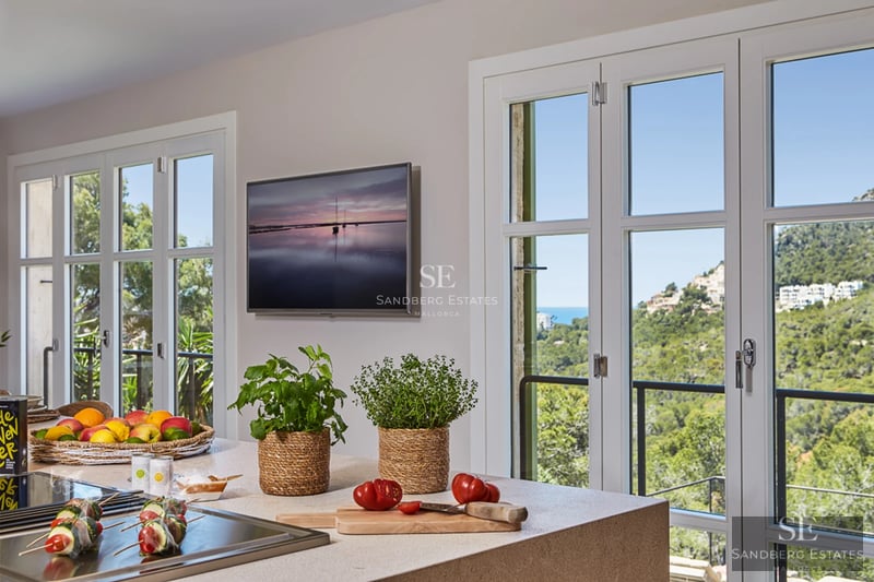 Spacious exterior with pool, sun loungers, and landscaped area. Modern and relaxing design for enjoying the outdoors.