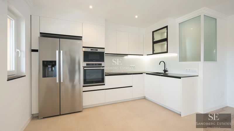 Exterior view of a modern villa with an infinity pool, surrounded by greenery. Sleek, minimalist architecture.
