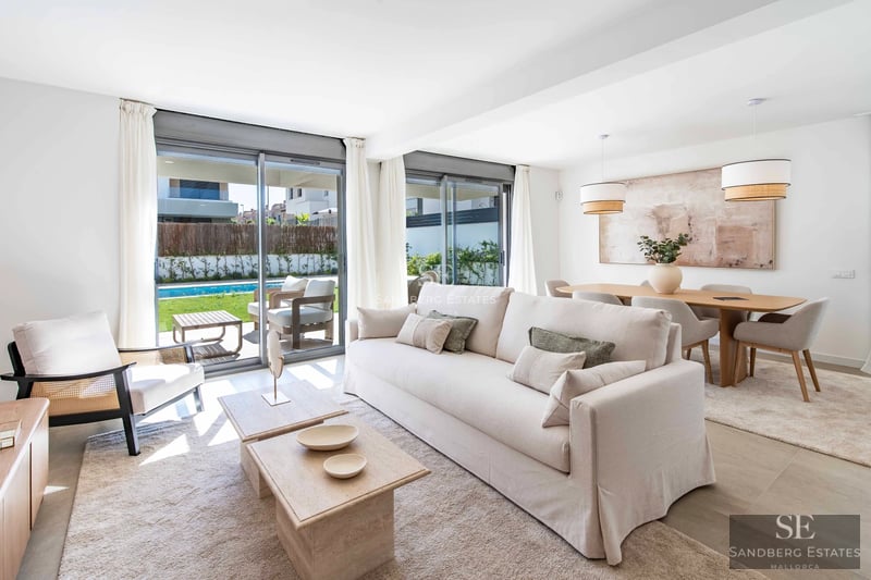 Aerial view of a luxurious modern house with pool, verdant garden and minimalist architecture. Elegant exterior design.