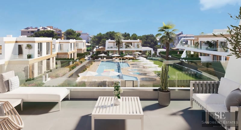 View of a modern villa featuring a pool, garden, and terraces. Minimalist architecture with large windows and stone detailing.