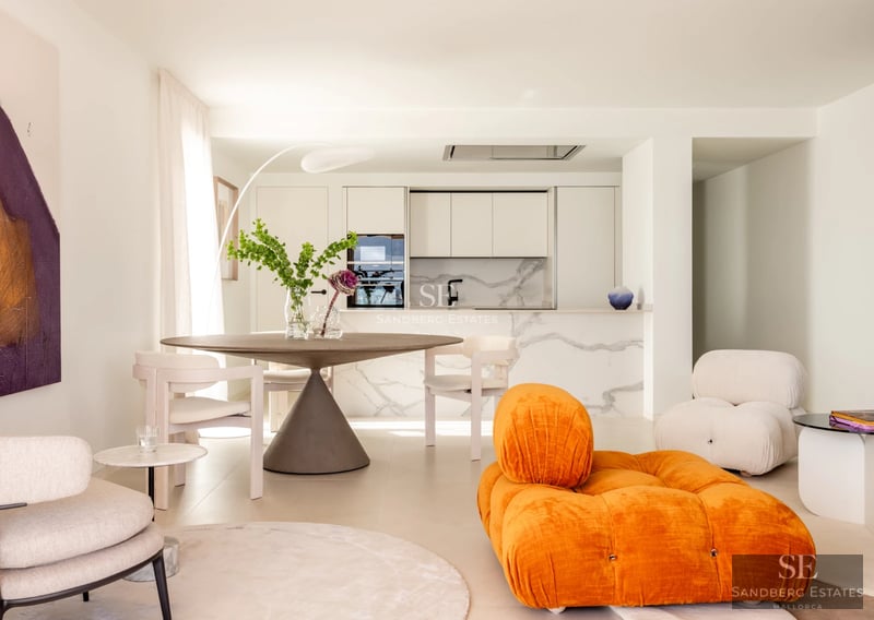 Pool and terrace view of modern villa. Clean architecture, infinity pool, ample outdoor space. Luxury and comfort.