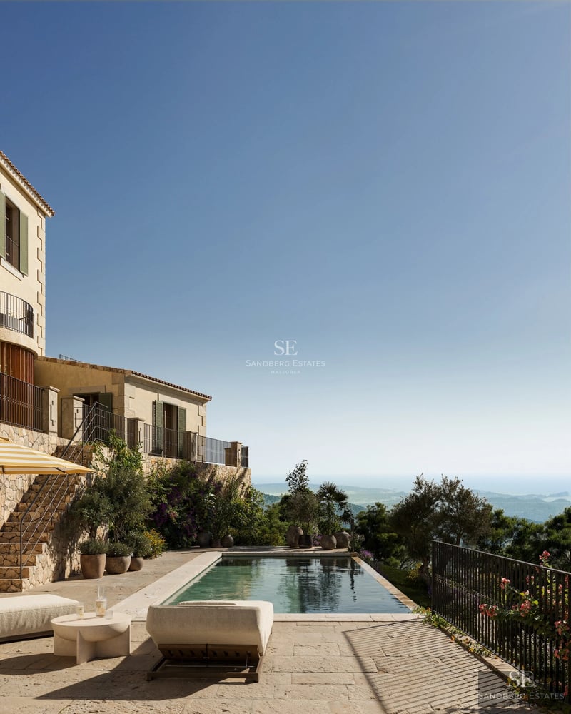 Exterior view of a modern villa featuring a pool, lush gardens, and expansive terraces. Minimalist and elegant design.