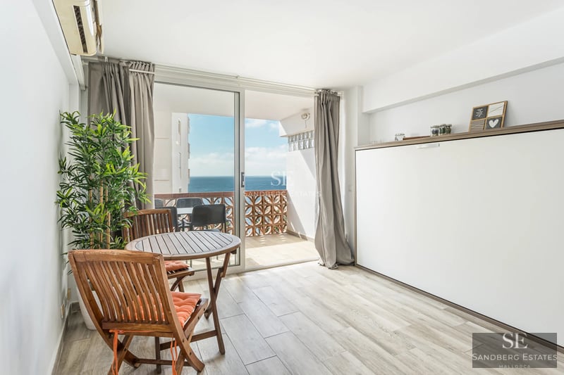 Spacious terrace with pool, sun loungers, and views. Modern design with high-quality materials. Natural lighting.