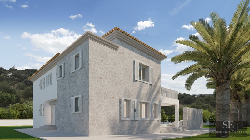 Two-story stone villa with white shutters and terracotta roof next to palm trees under a blue sky.