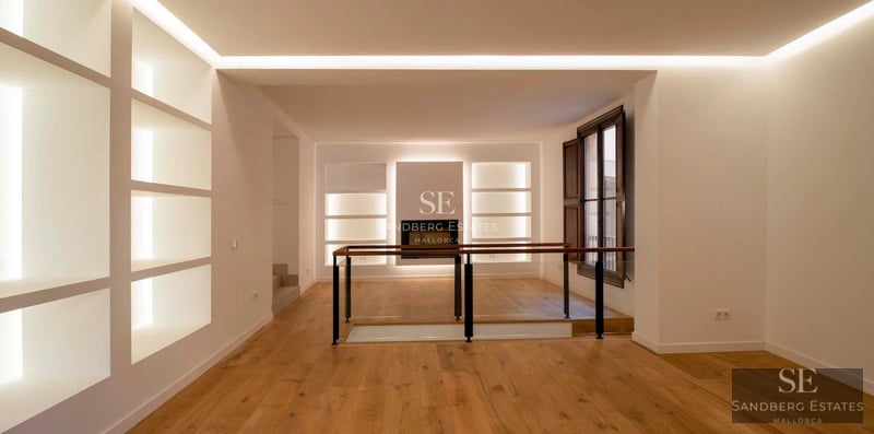 Exterior view of a modern house featuring a swimming pool, lush garden, and expansive terraces. Sleek, contemporary architectural design.