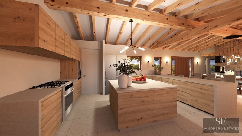 Spacious kitchen featuring exposed wood beams, light oak cabinetry, and a large central island.