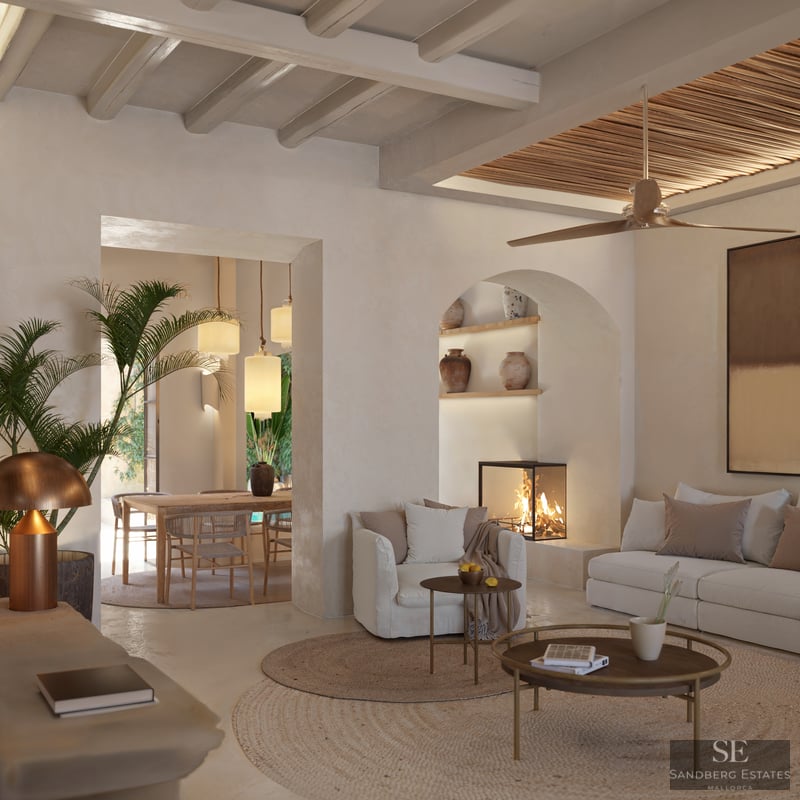 Elegant living room with white sofas, wooden beams, a glass fireplace, and an arched niche with decorative vases.