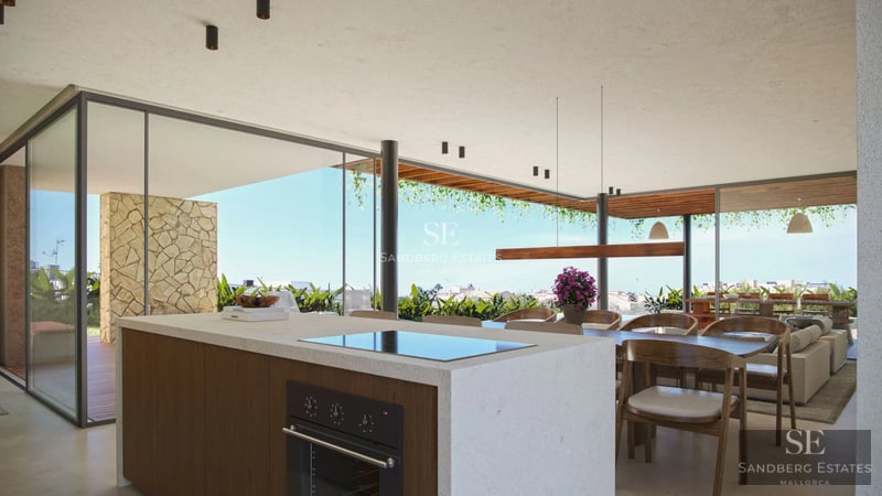 Spacious living room with sea view windows, light wood flooring, grey sofas, and minimalist decor. Abundant natural lighting.