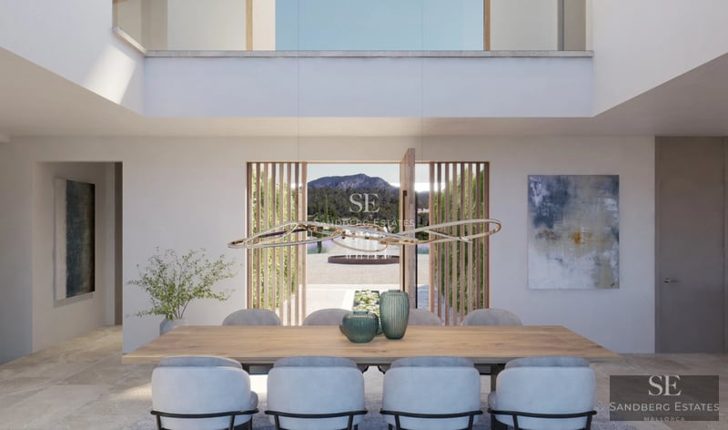 Spacious living room featuring floor-to-ceiling windows, designer sofas, modern coffee table, and terrace access with panoramic views. Elegance and comfort.