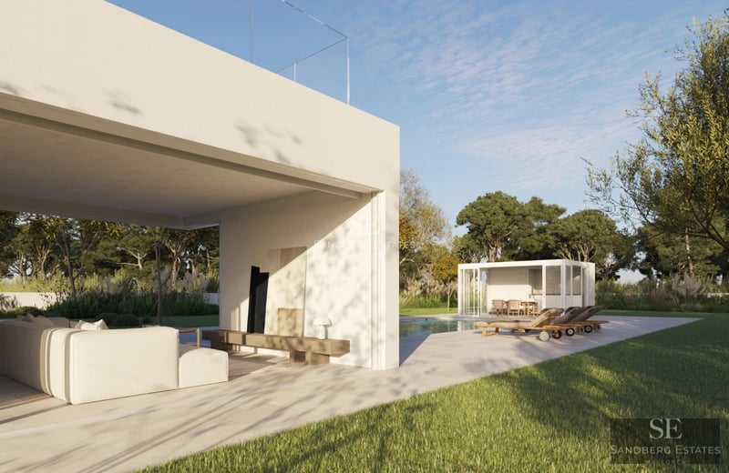 Exterior view of a luxurious villa with a pool. Modern architecture with large windows and lush gardens.