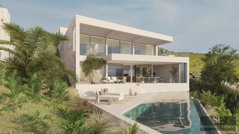 Modern two-story villa with white facade, floor-to-ceiling windows, infinity pool, and sun loungers.