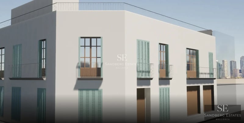 Spacious living room with large windows, designer sofas, light wood flooring, and direct access to the terrace. Minimalist and bright decor.