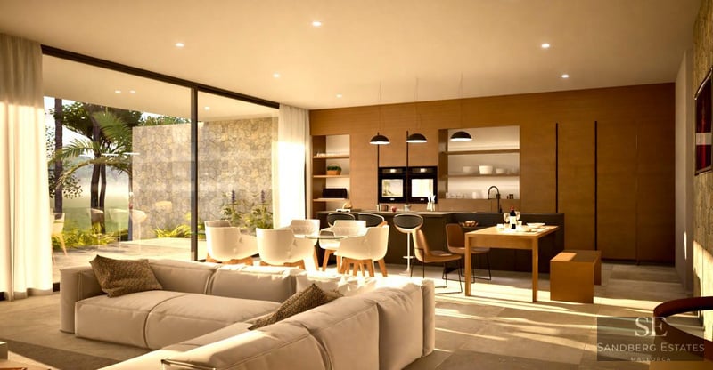 Spacious modern living room with a large white sectional sofa, dining area, and kitchen opening to a sunny terrace.