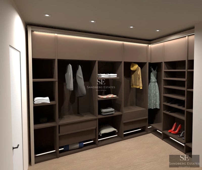 Spacious living room with panoramic sea views. Modern design, gray sofas, glass coffee table, and light wood flooring.