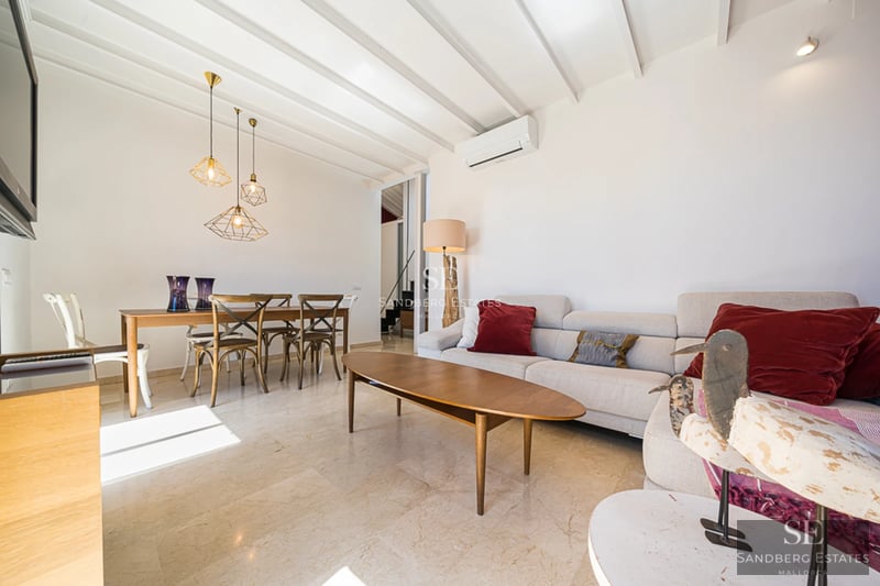 Exterior view of a luxury home with pool, modern architecture, large windows, and lush garden. Minimalist design and high-end finishes.