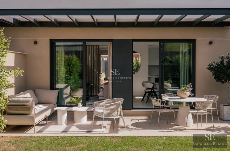 Exterior view of modern villa with infinity pool, large windows, and lush garden. Minimalist architecture and elegant design.