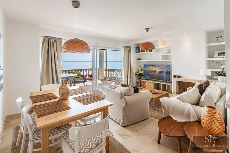 Exterior view of a modern home with a pool, garden, and large window. Minimalist design with high-quality finishes.