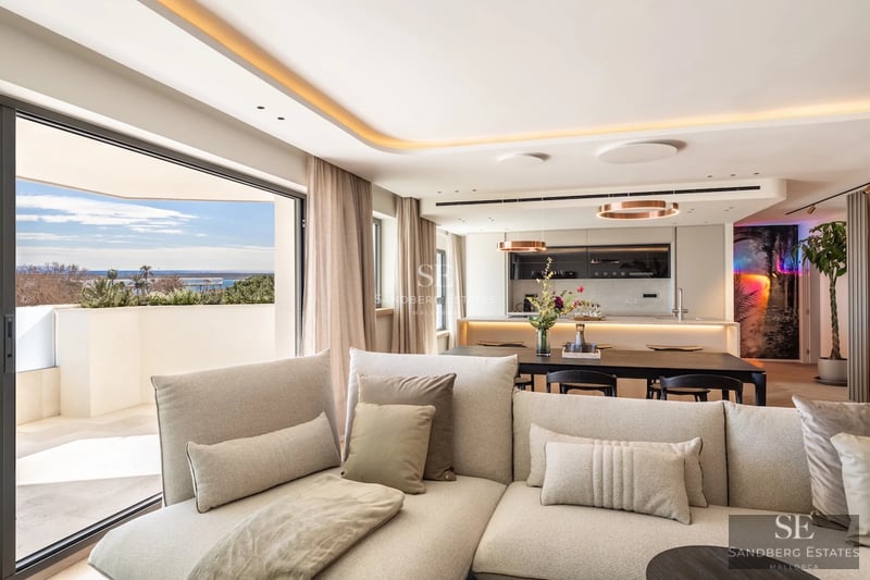 View of a modern villa with a pool. Minimalist architecture, large windows, turquoise pool, and lush vegetation. Elegant design.