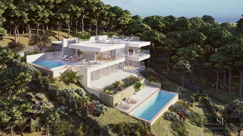 Expansive terrace with infinity pool. Panoramic views. Modern design. Stylish outdoor furniture. Ideal for relaxation.